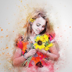 Girl holding sunflowers.
